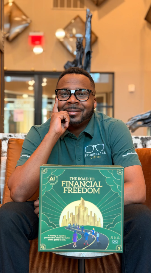 Founder holding the game box
